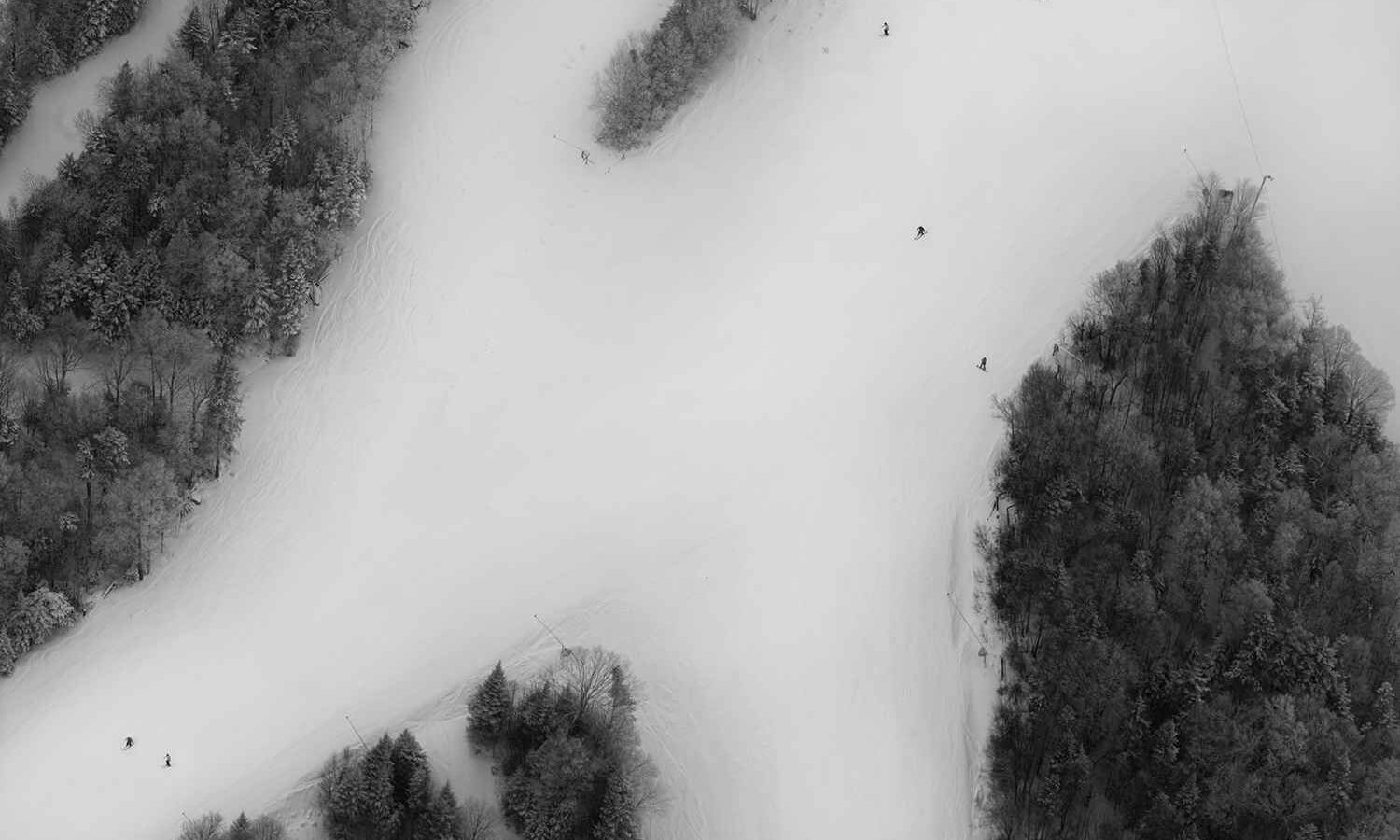 Aerial view of a the junciton of a ski mountain.